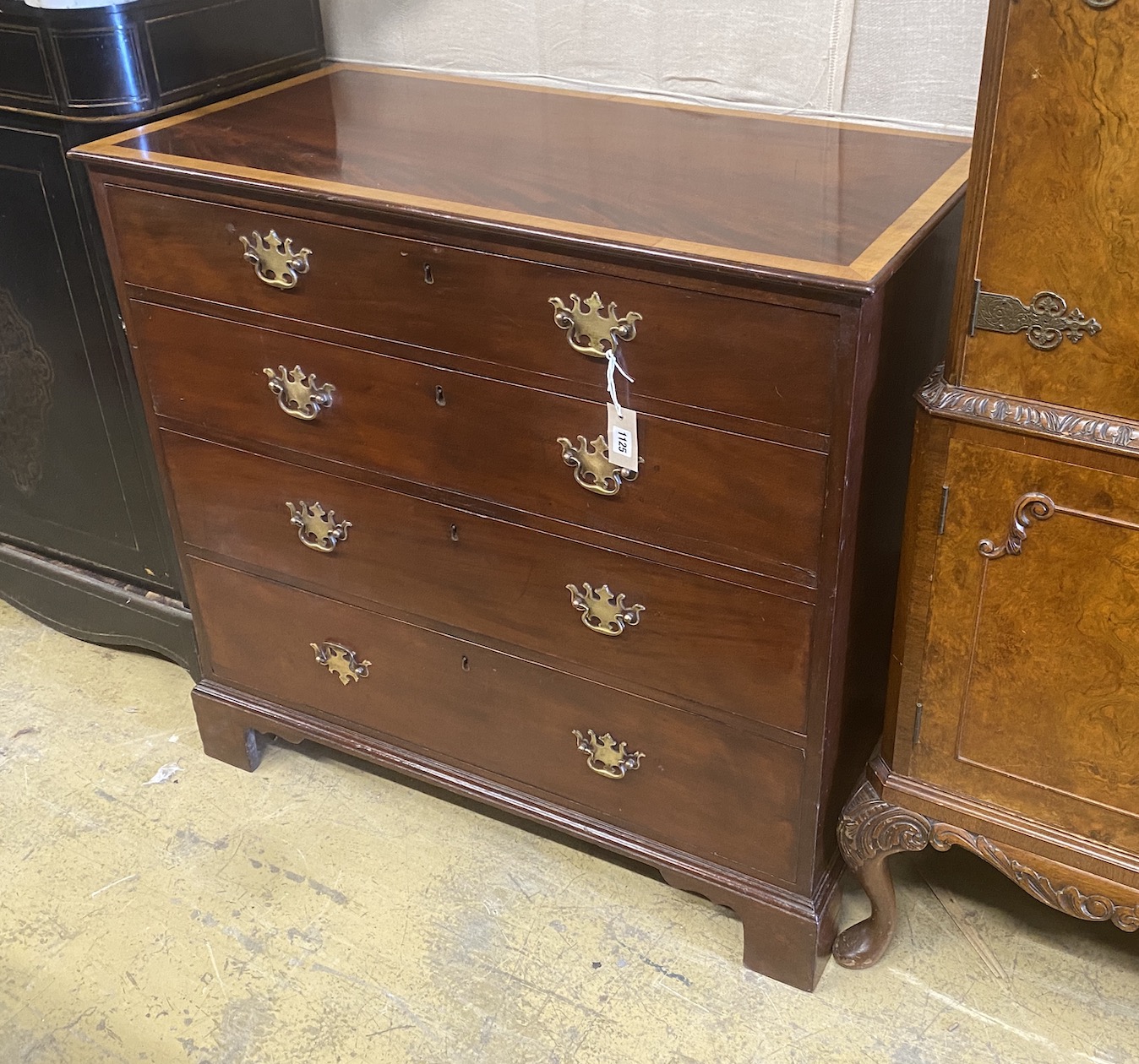 A George III satinwood banded mahogany four drawer chest, width 95cm, depth 49cm, height 89cm